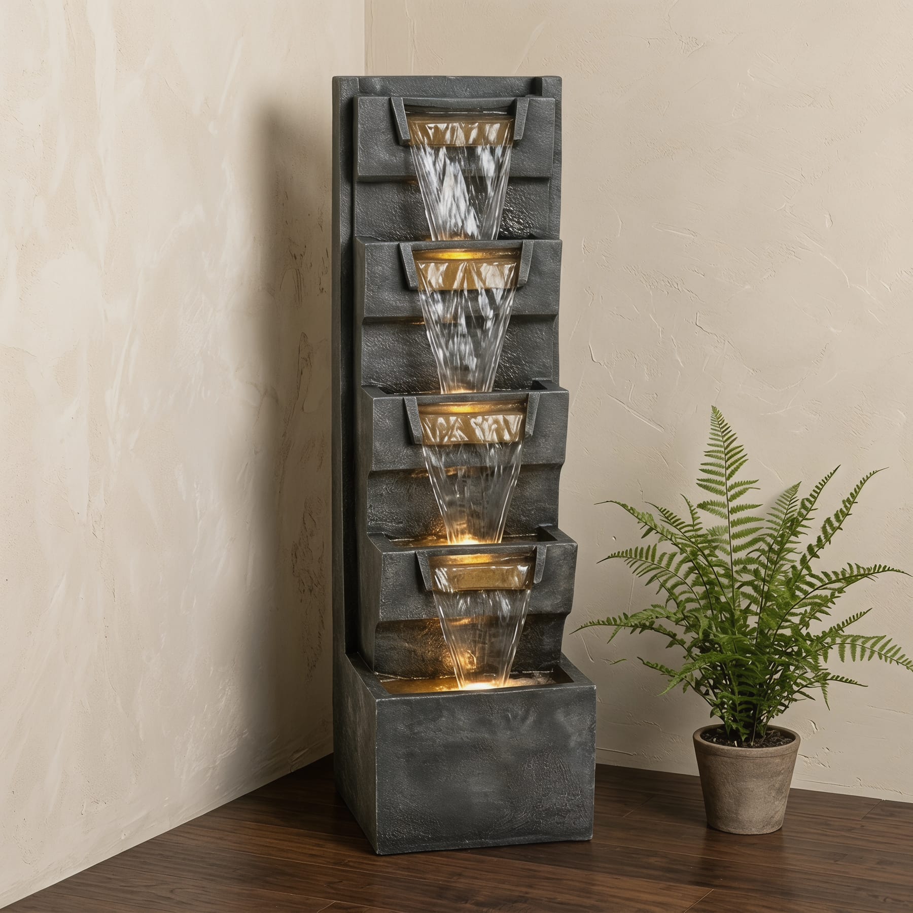 tall 4-tier waterfall fountain with warm LED lights displayed indoors