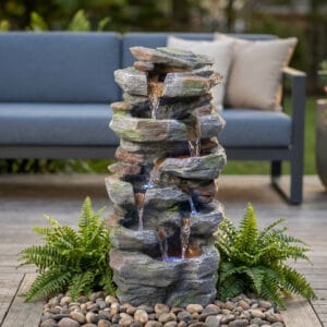 vertical rock waterfall fountain with LED lights and cascading water for patio garden and porch