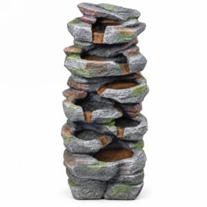 vertical rock waterfall fountain with LED lights on white background